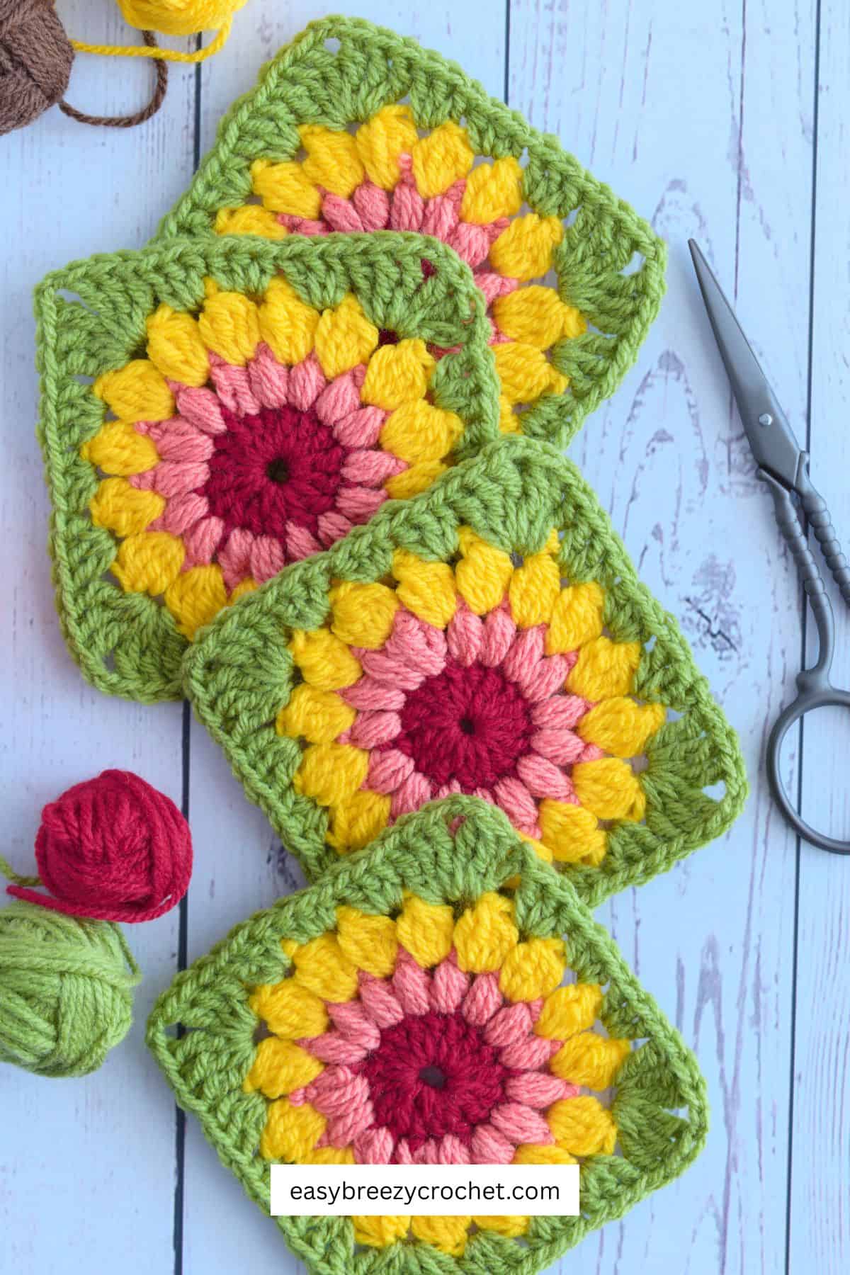 Four sunburst granny squares.