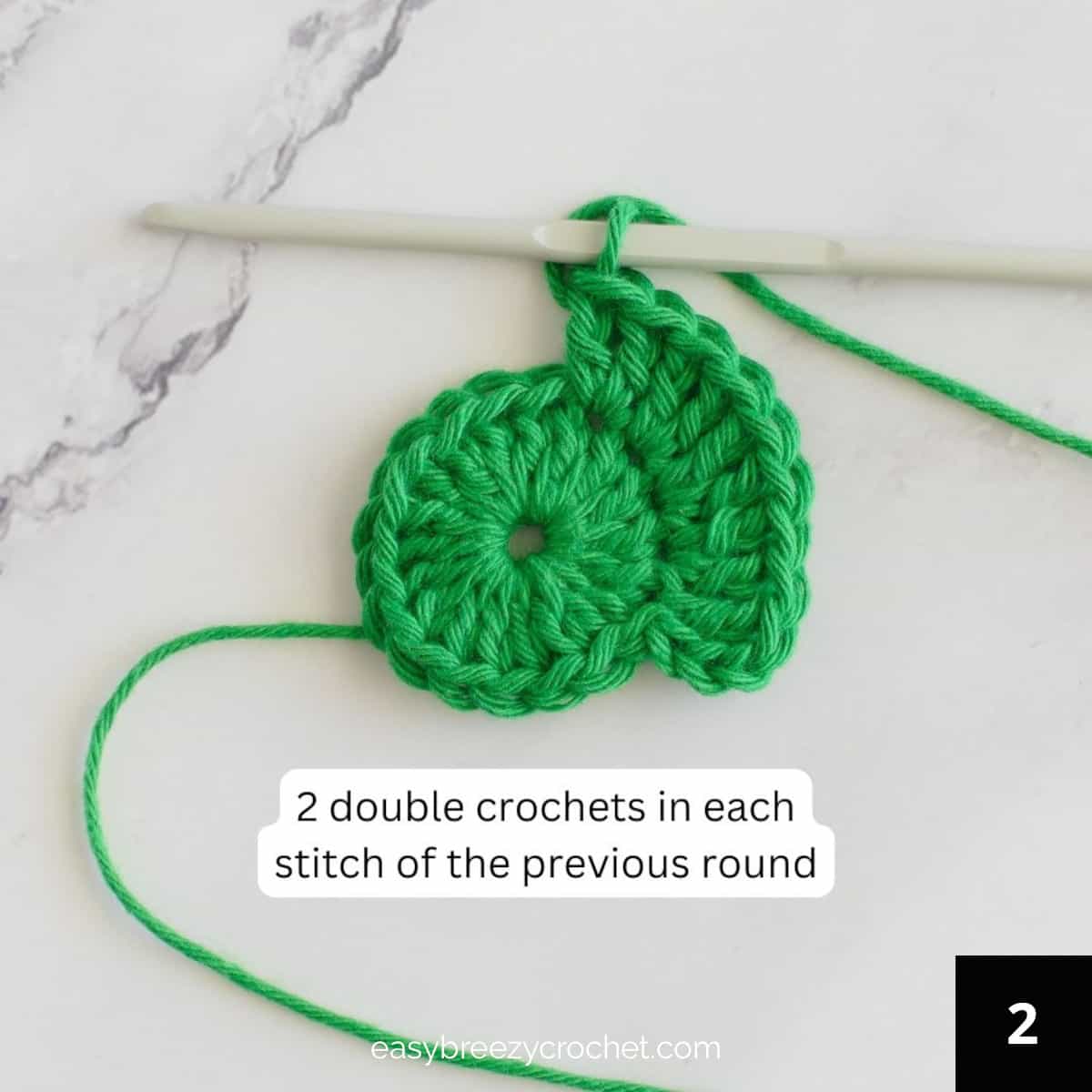 Image showing where stitches should be placed in round 2 of making a crocheted basket.