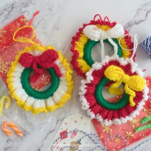 Three mini crocheted wreaths.