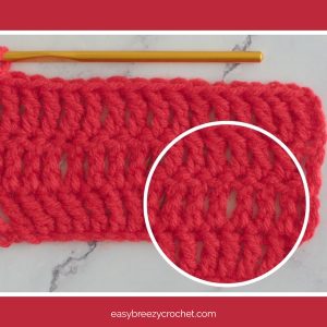 Treble crochet in red yarn.