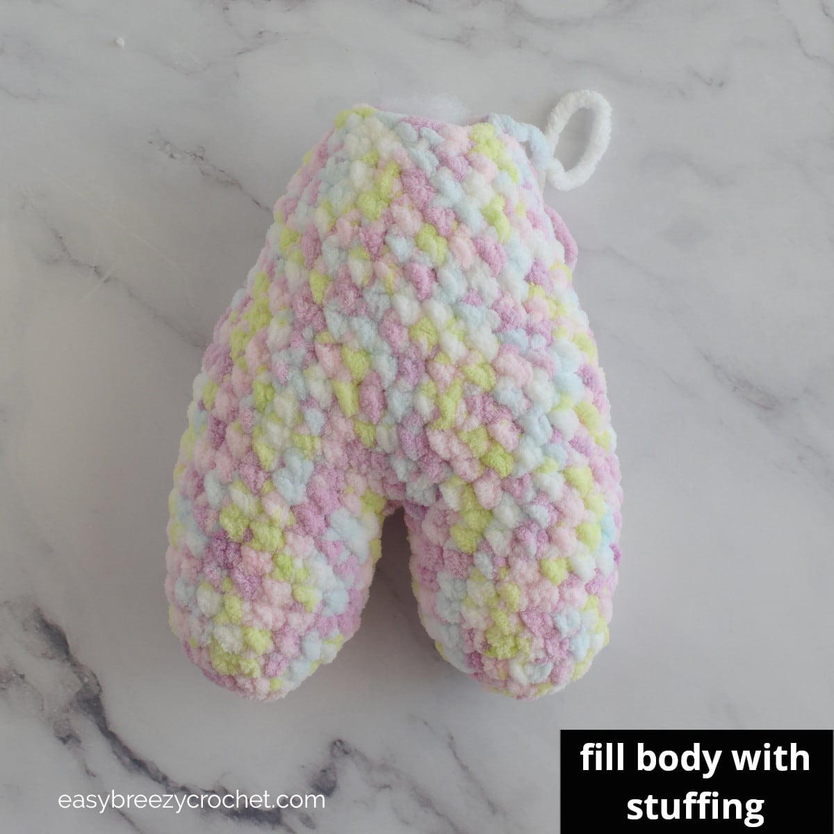 Crochet bunny body filled with stuffing.
