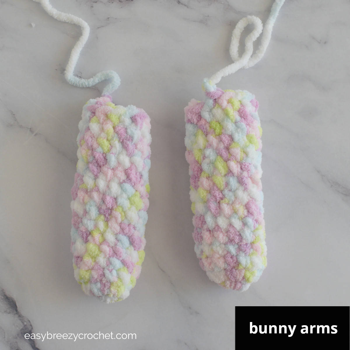 Two crochet pieces for bunny arms.