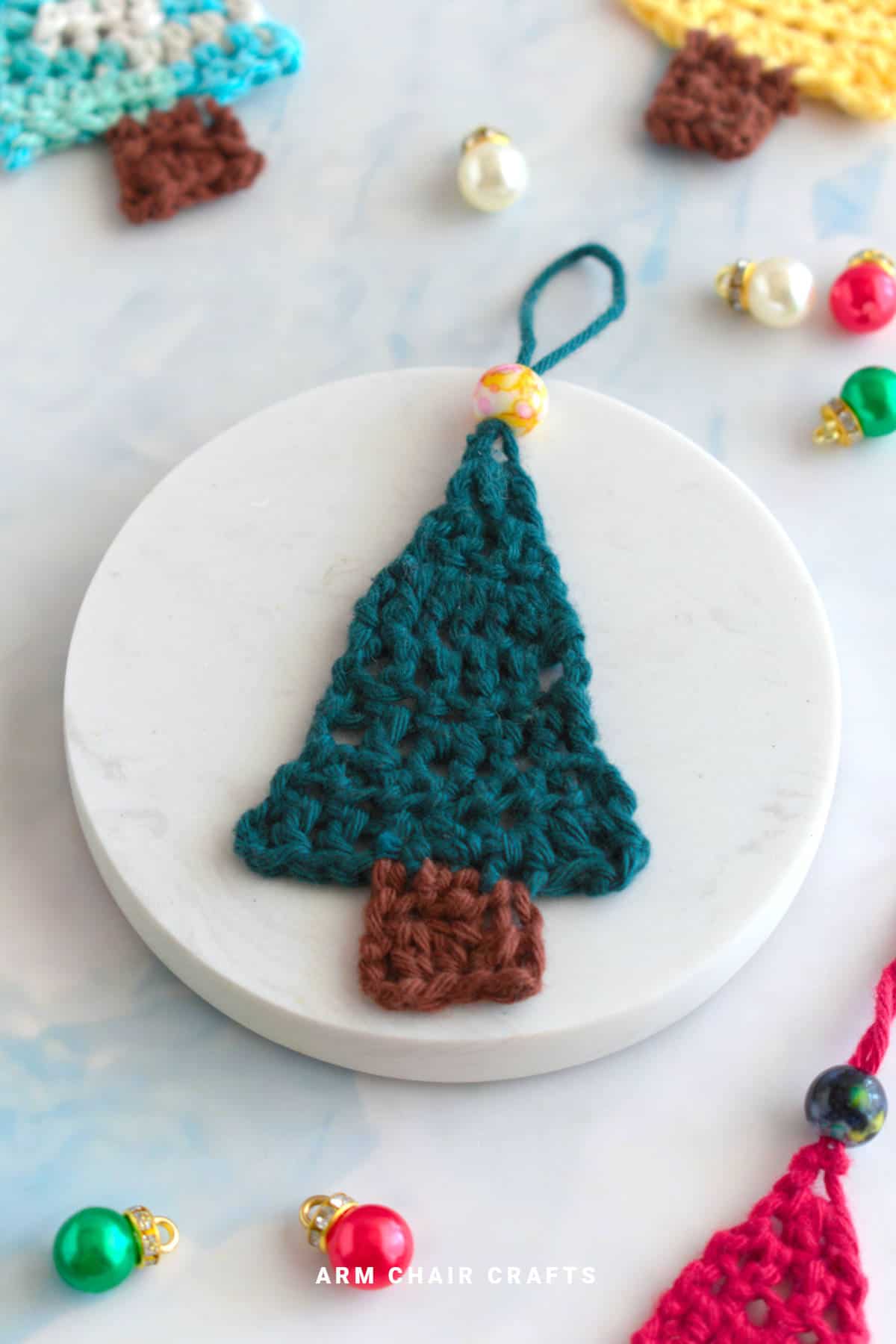Crochet Christmas tree ornament.