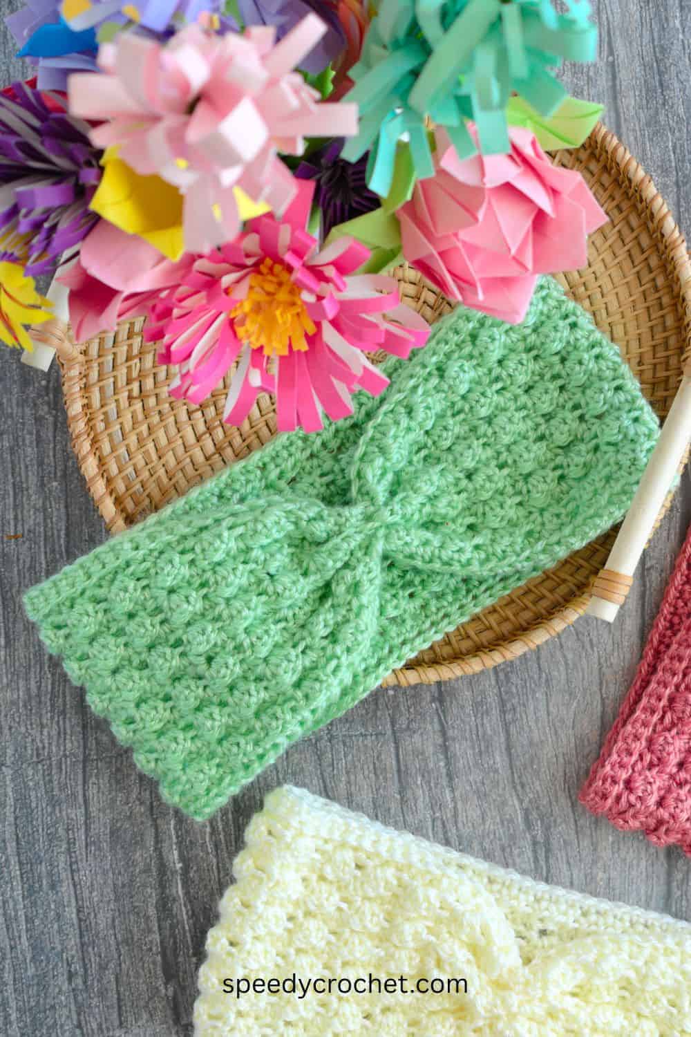 Green crochet ear warmer headband.