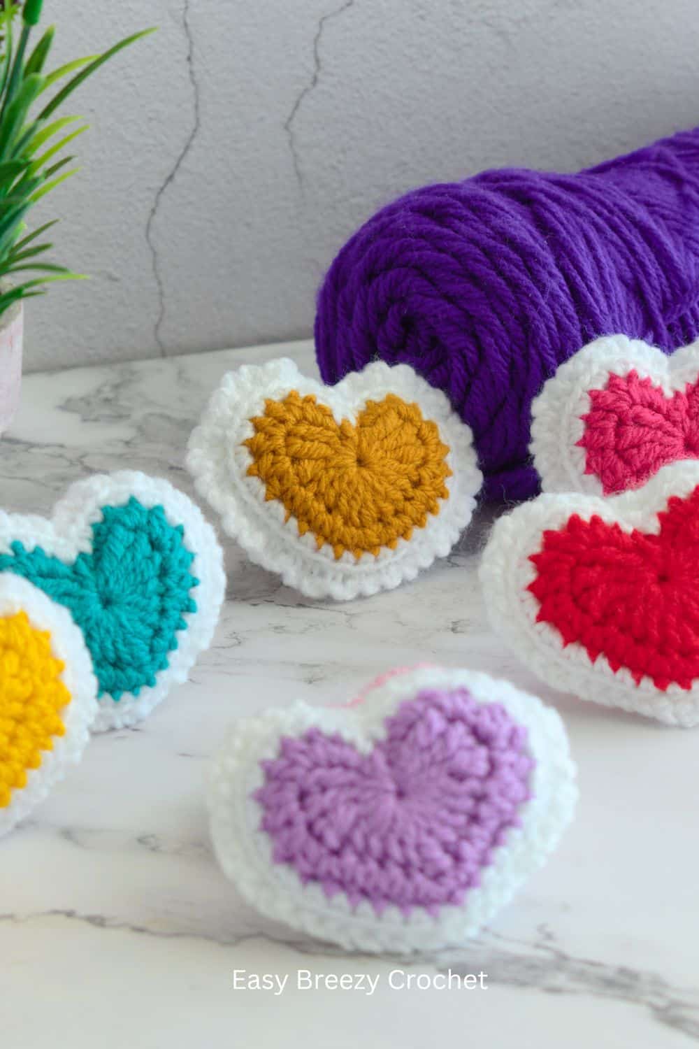 A line of puffy crochet hearts.