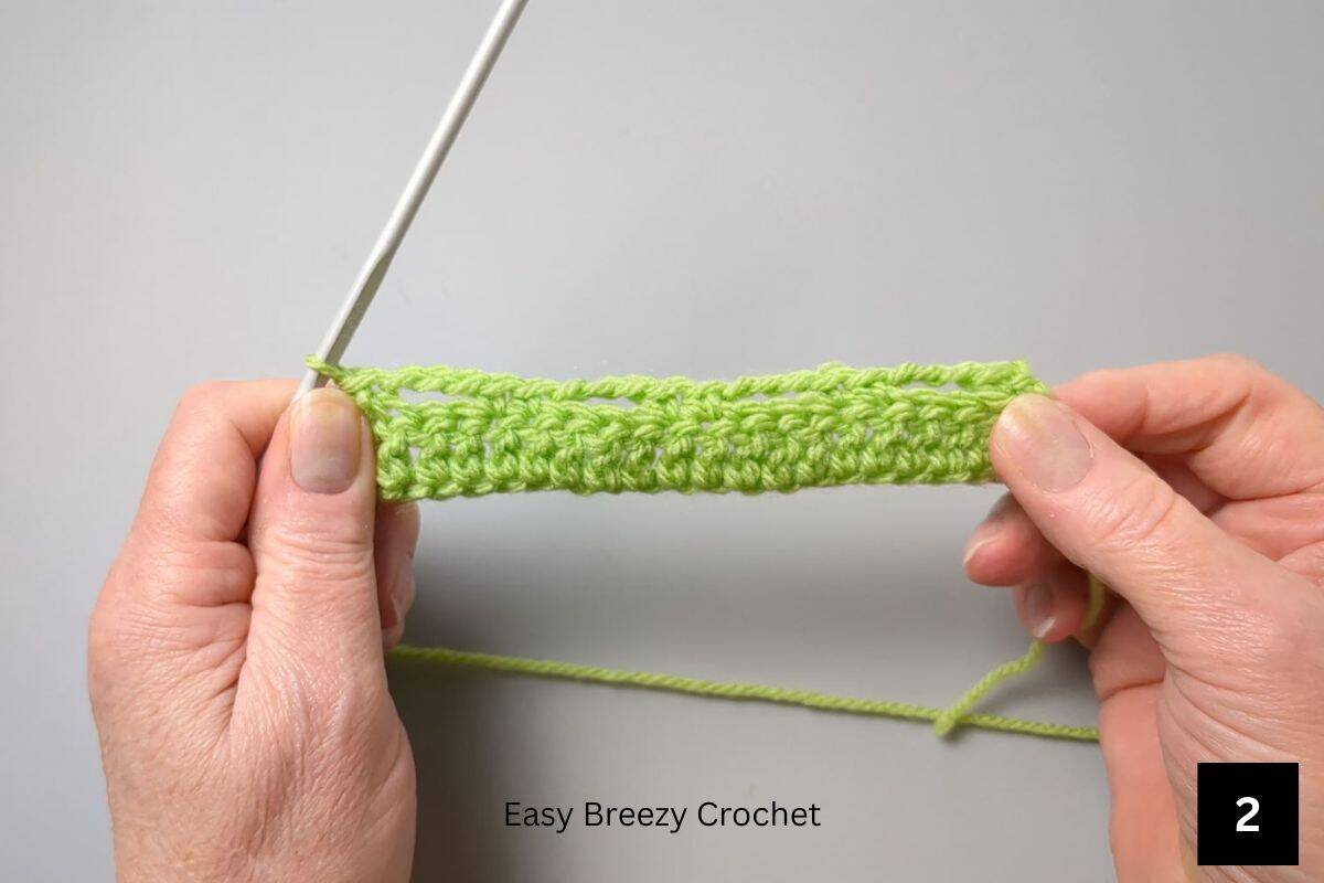 A crochet swatch in green yarn.