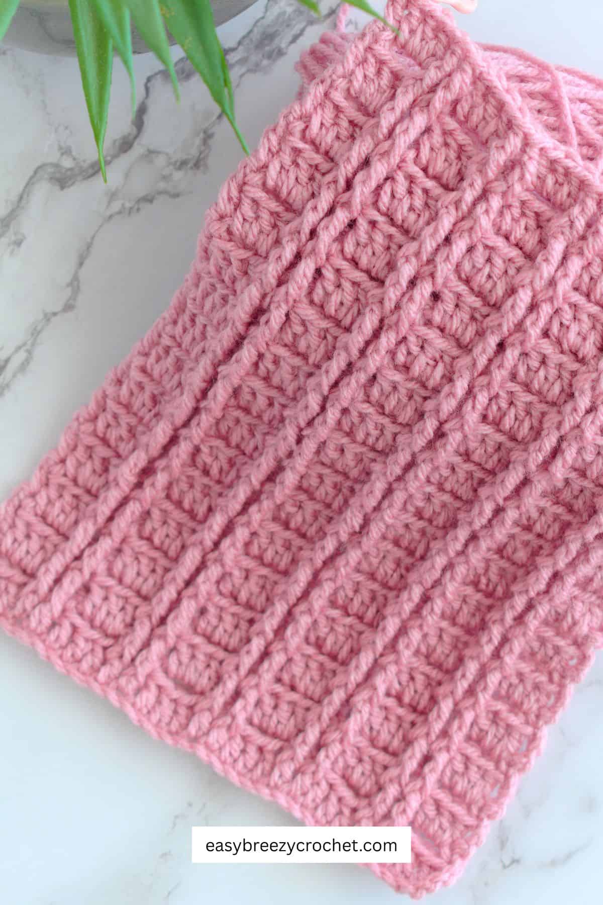 One tone vertical raised post stich fabric.