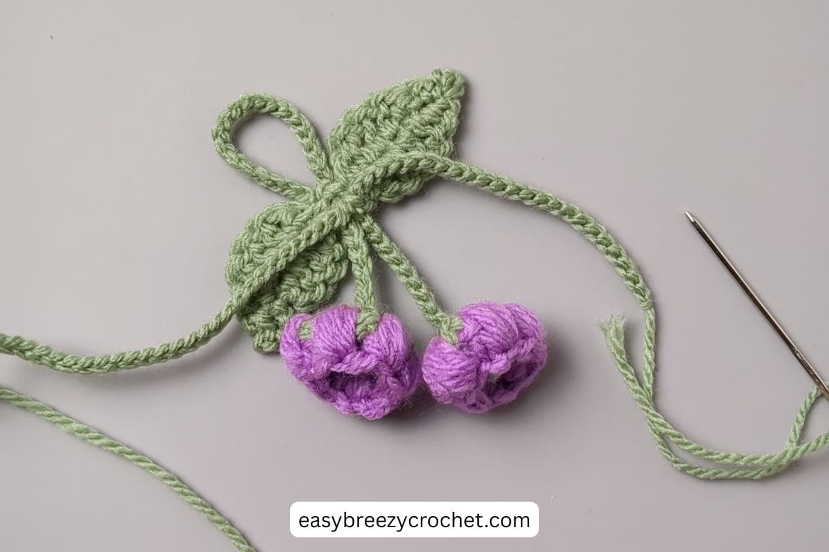 Image showing placement of second flower stem for a bag charm.