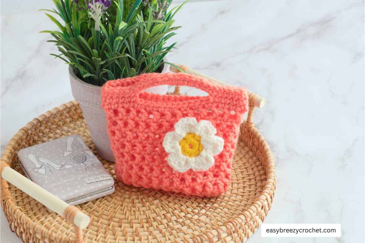 Orange crochet gift bag.