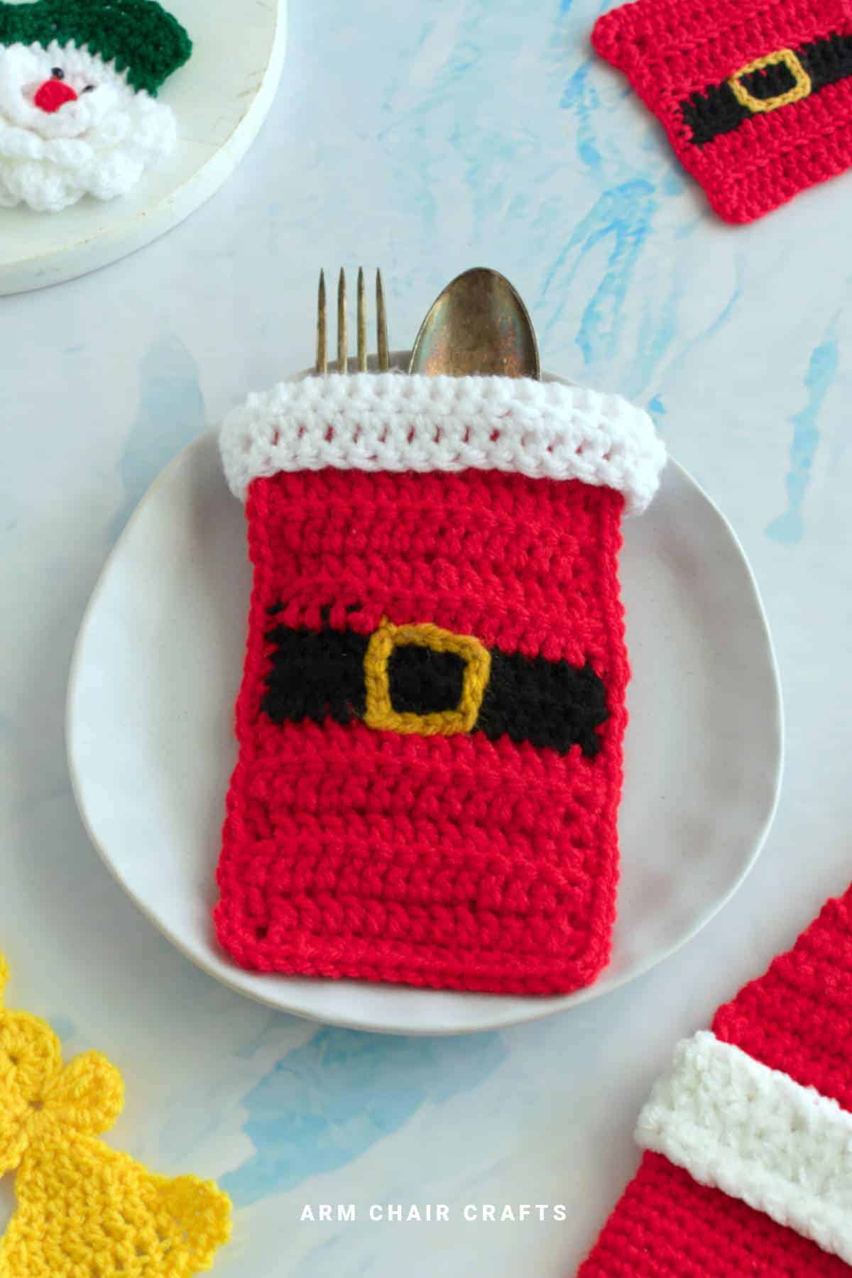 Santa cutlery holder on a plate.