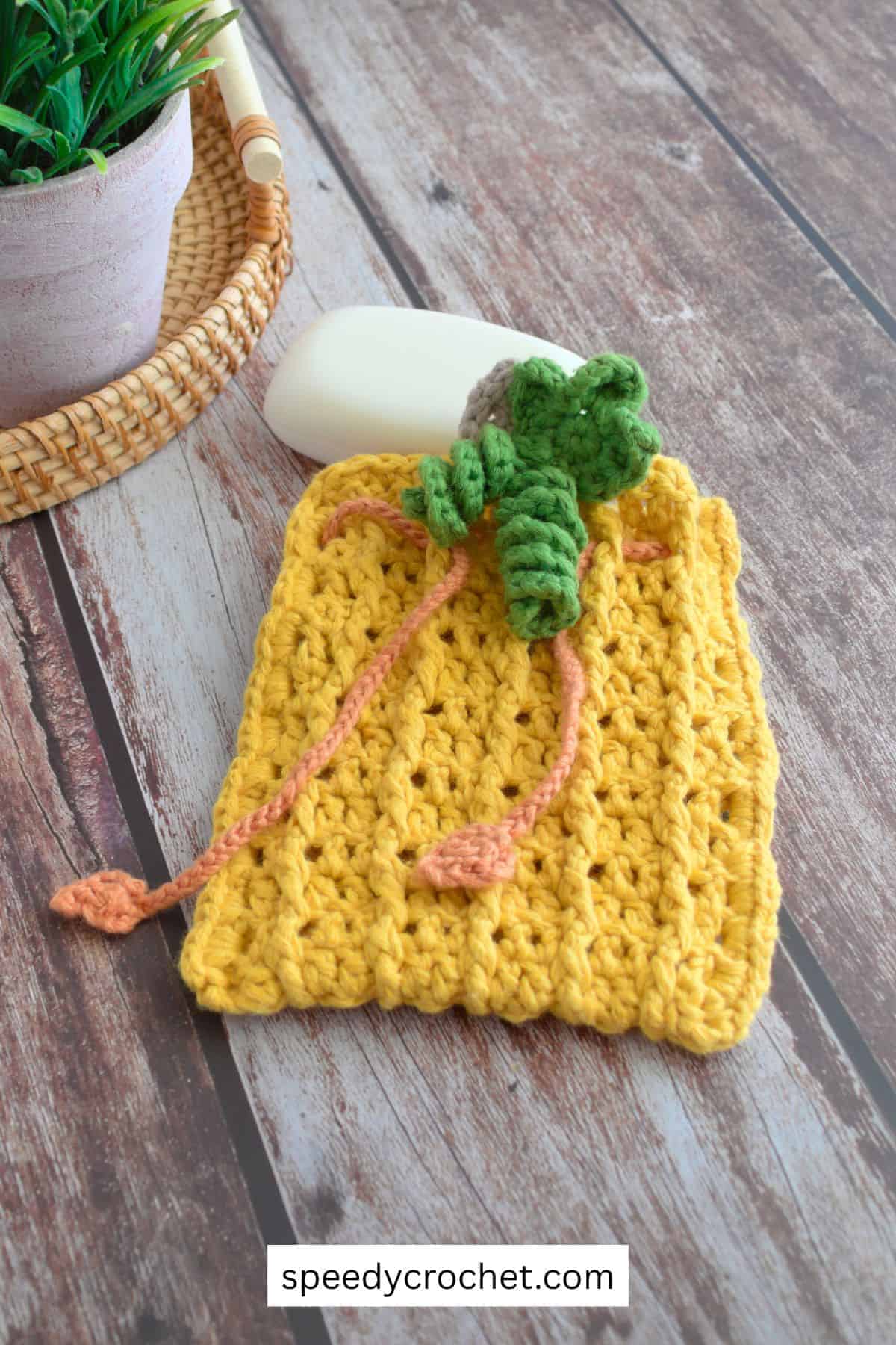 Pumpkin themed crochet soap saver pouch.
