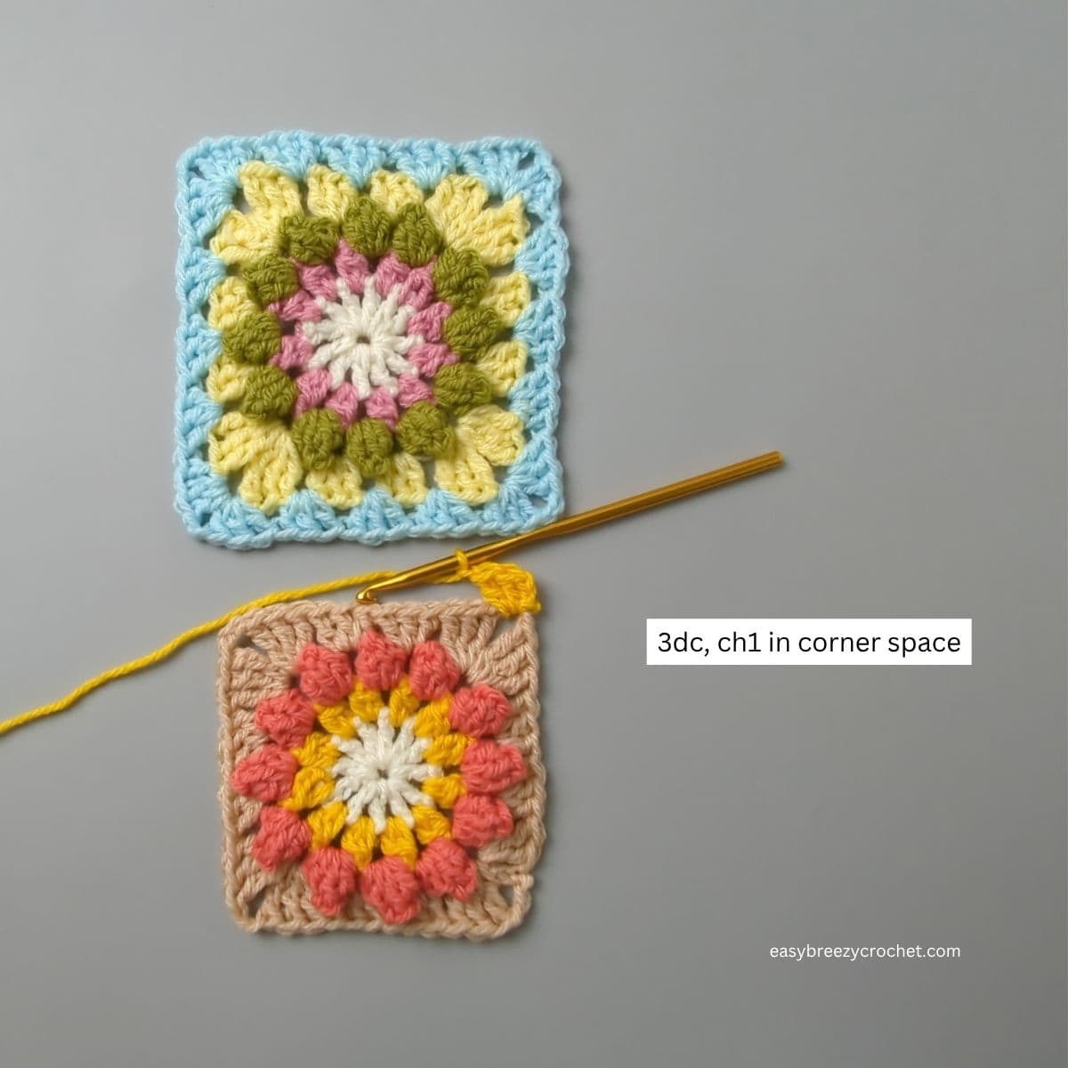 Three double crochet in a corner space on a granny square.