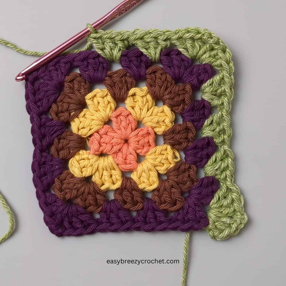 Round five of a granny square.