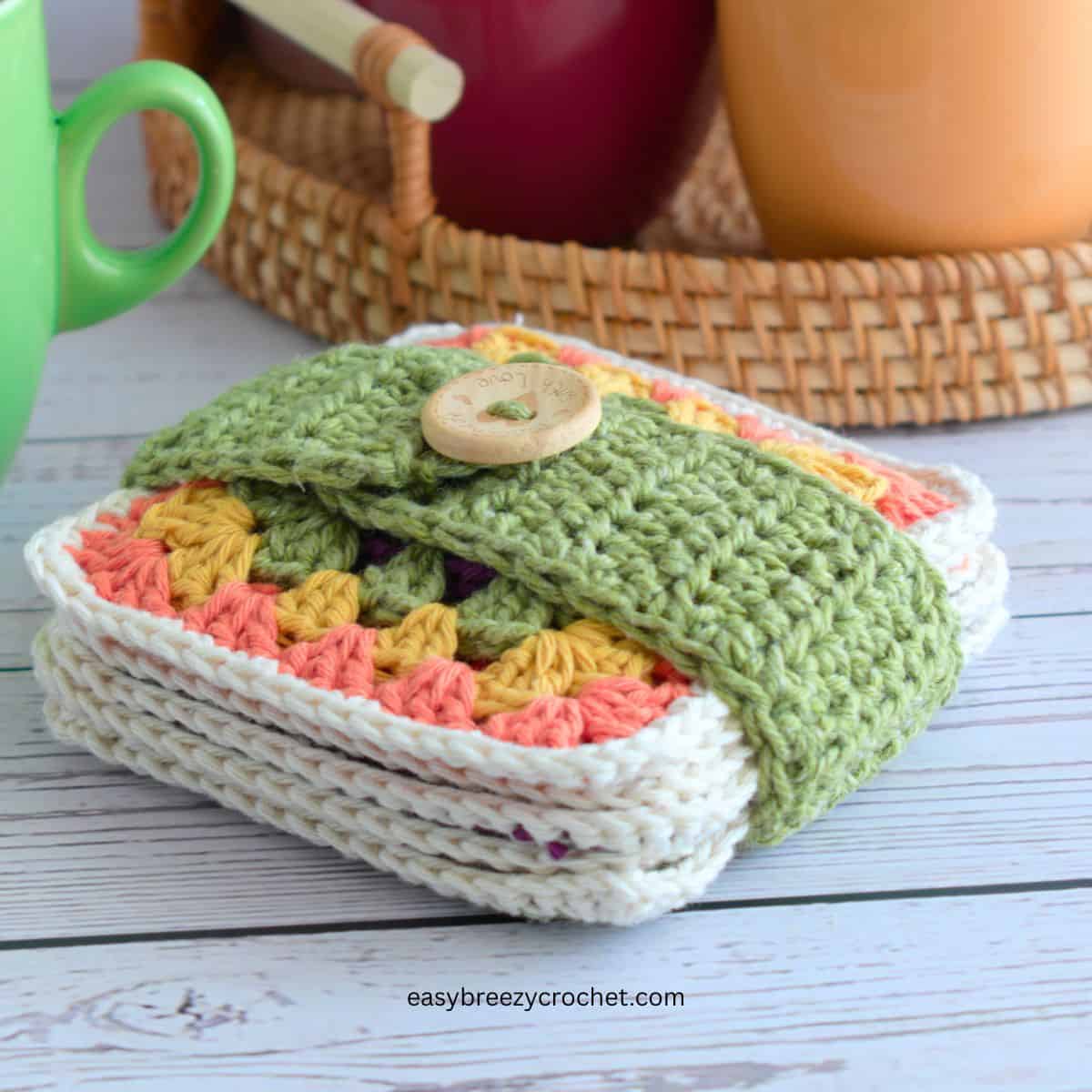 Granny square crochet coaster with strap.
